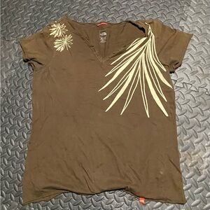 The North Face Brown Short-Sleeve V-Neck Top with Cream Leaf Graphic